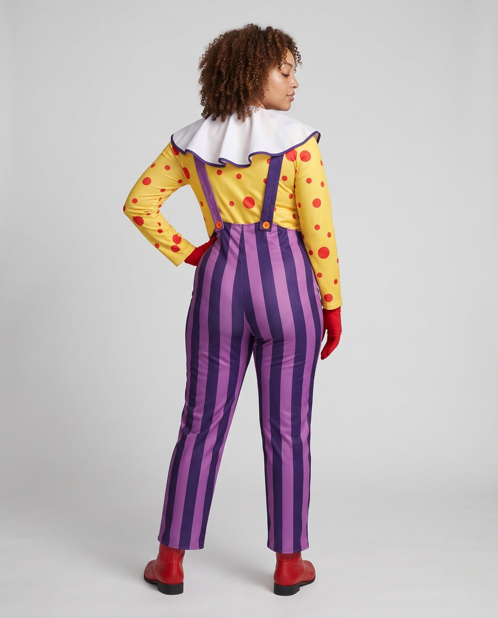 Women's clown Halloween costume with yellow polka dot top, white ruffle collar and purple striped overalls - view 2