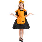 Girl wearing black puff-sleeve pumpkin Halloween costume dress with orange ruffled apron - view 2