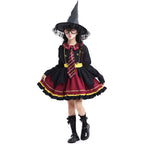 Girl wearing a black and burgundy witch costume with striped tie, yellow sash, ruffled skirt and lace-trimmed pointed hat - view 2