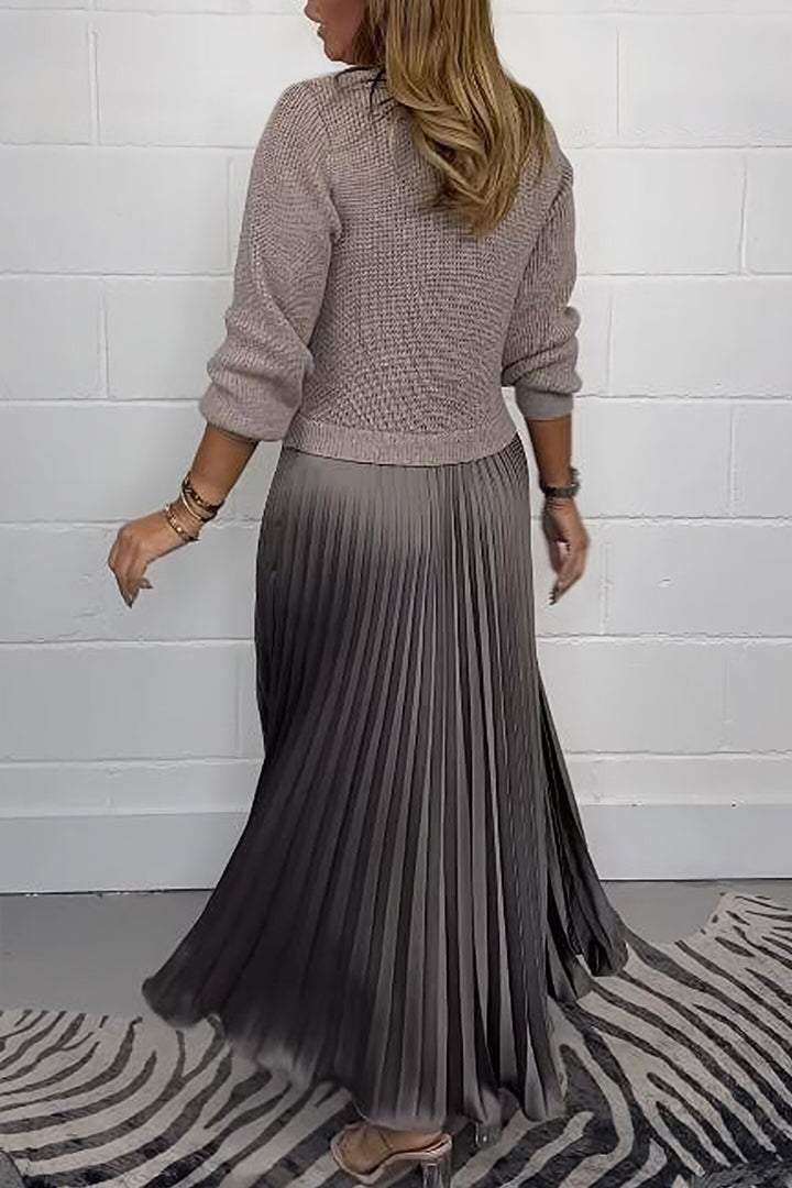 Woman wearing a long sleeve maxi sweater dress with ribbed knit top and pleated satin-look skirt - view 3