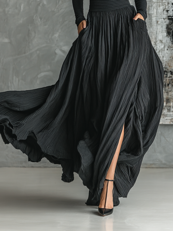 Black pleated maxi skirt set with fitted turtleneck top in motion - view 5
