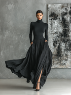 Black pleated maxi skirt set with fitted turtleneck top in motion - view 6