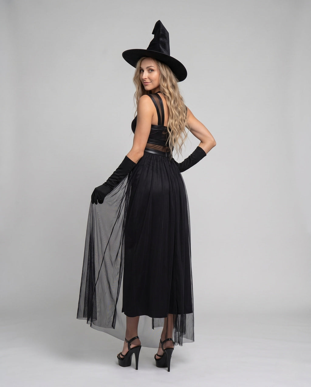 Women's black witch costume with sheer mesh overskirt and pointed hat - view 3