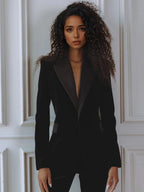 Woman wearing a red velvet suit with satin peak lapel blazer and flare pants - view 9