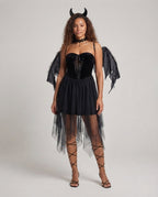Black velvet corset dress with lace-up front and sheer tulle handkerchief skirt