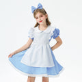 Girl wearing a blue costume dress with white apron, Peter Pan collar, puff sleeves and lace-trimmed hem