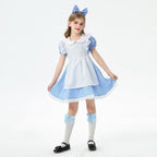 Girl wearing a blue costume dress with white apron, Peter Pan collar, puff sleeves and lace-trimmed hem - view 4