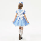 Girl wearing a blue costume dress with white apron, Peter Pan collar, puff sleeves and lace-trimmed hem - view 5