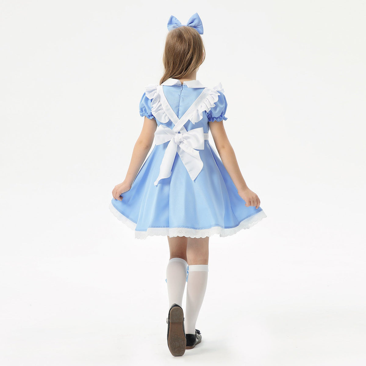 Girl wearing a blue costume dress with white apron, Peter Pan collar, puff sleeves and lace-trimmed hem - view 5