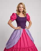 Women's princess Halloween costume dress with purple bodice, pink puff sleeves, lilac overskirt and ruffled skirt - view 2
