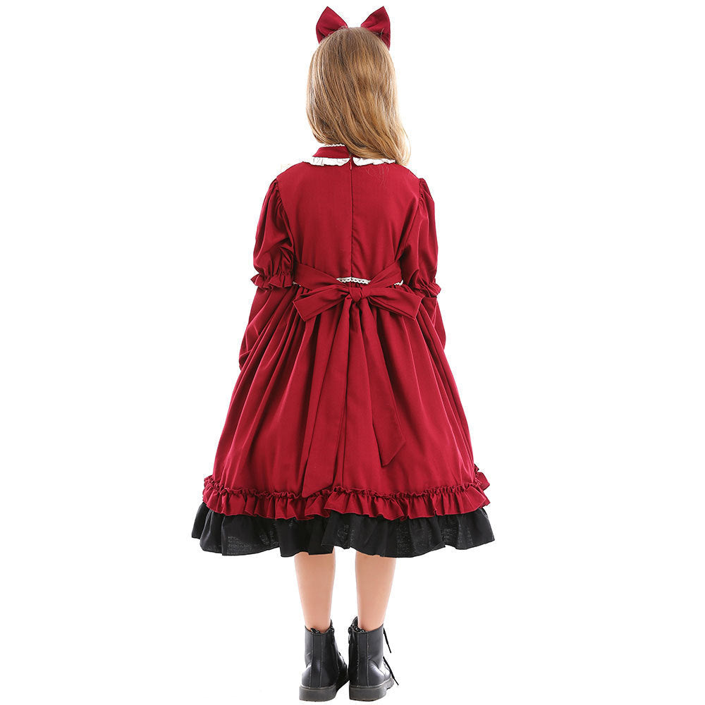 Girls red costume dress with ivory ruffled bib, red bows and black tiered ruffle hem - view 4