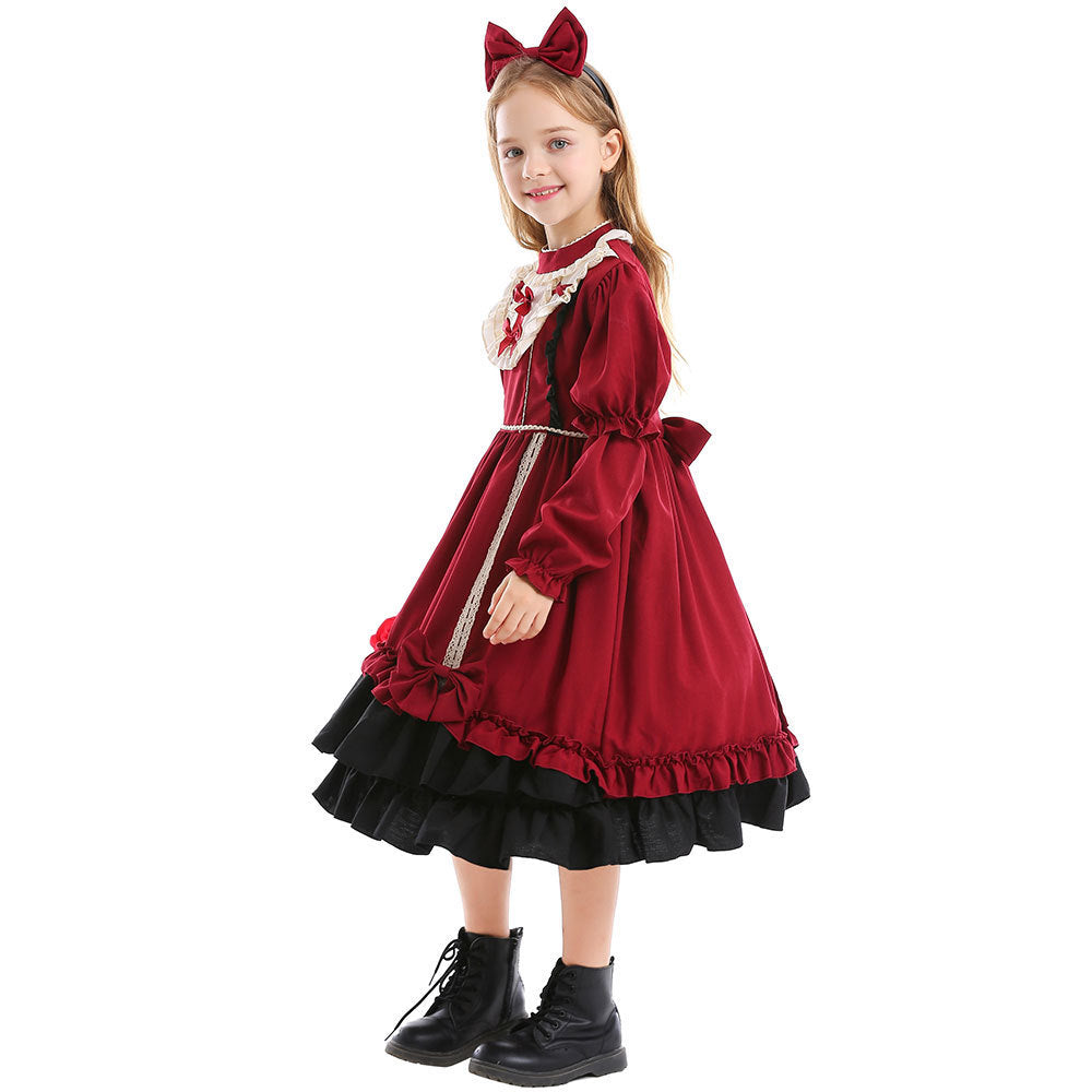 Girls red costume dress with ivory ruffled bib, red bows and black tiered ruffle hem - view 5