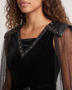 Women's black velvet Halloween costume dress with sheer tulle cape and studded shoulders - view 2
