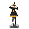 Black velvet-look witch costume dress with yellow bow sash and pointed witch hat