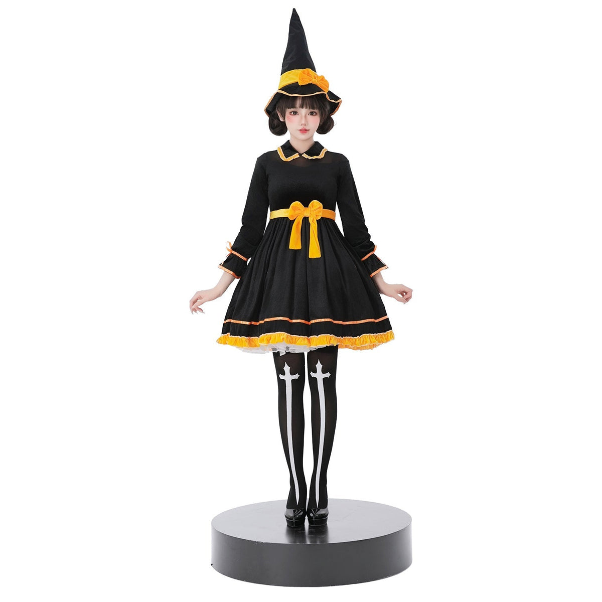 Black velvet-look witch costume dress with yellow bow sash and pointed witch hat - view 3