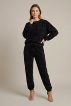 Women's textured jogger set with pocket crew neck sweatshirt and cuffed drawstring joggers