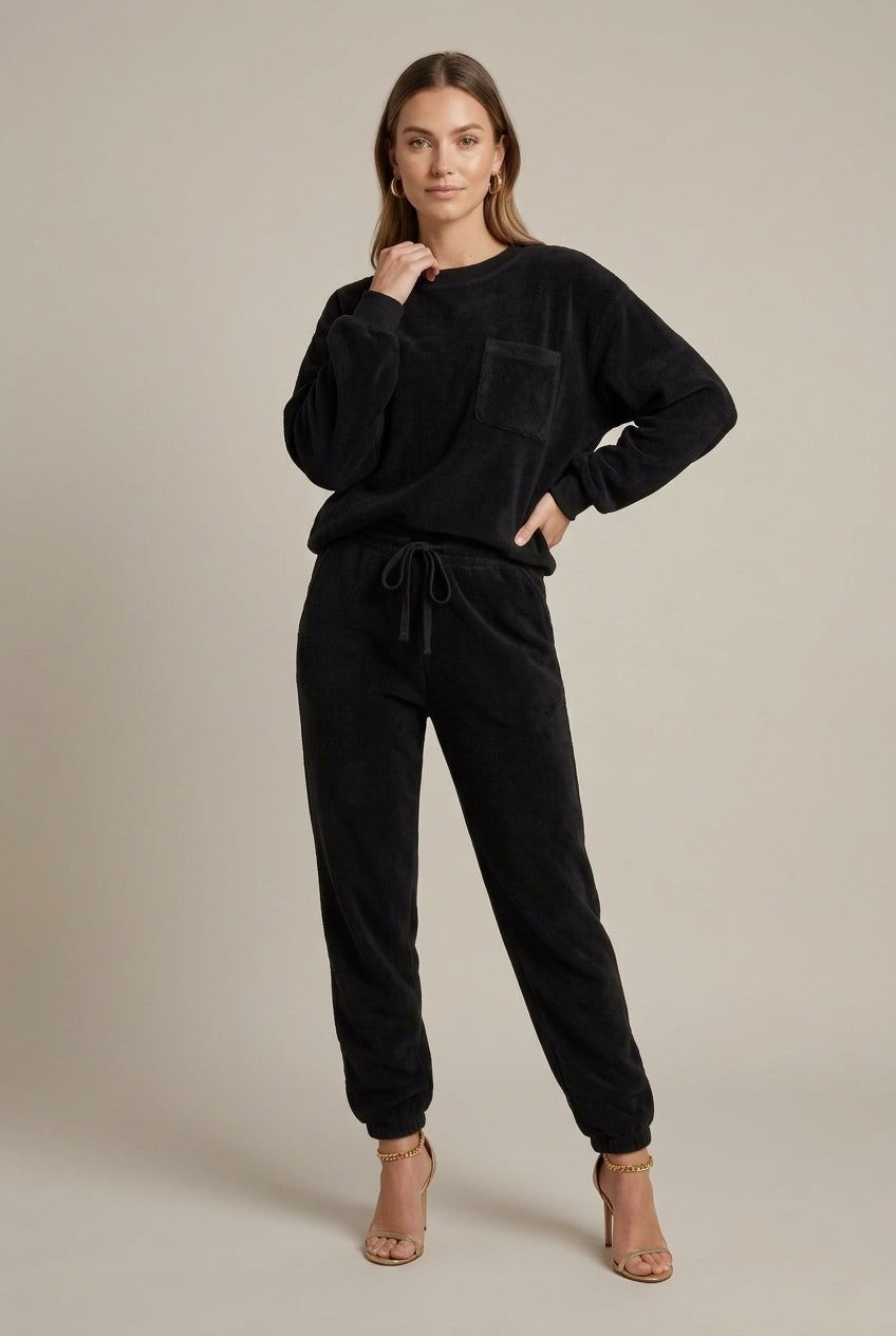 Women's textured jogger set with pocket crew neck sweatshirt and cuffed drawstring joggers
