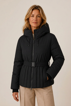 Belted quilted jacket with hood and pleat-like channel quilting