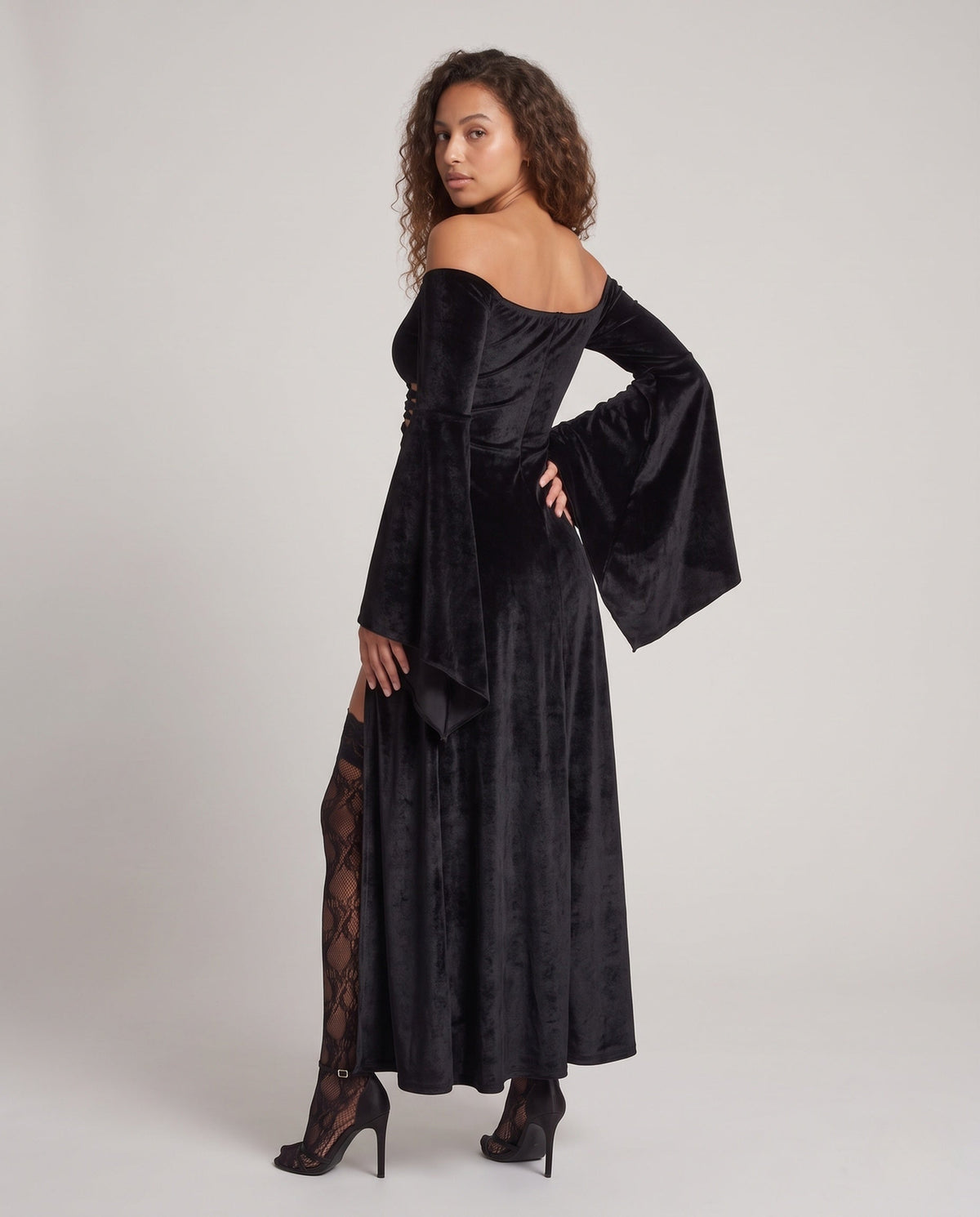 Black velvet off-the-shoulder maxi dress with bell sleeves and lace-up cutout bodice - view 3