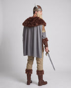 Men's Viking Halloween costume with brown faux fur collar, tunic, gray cape and khaki pants - view 3