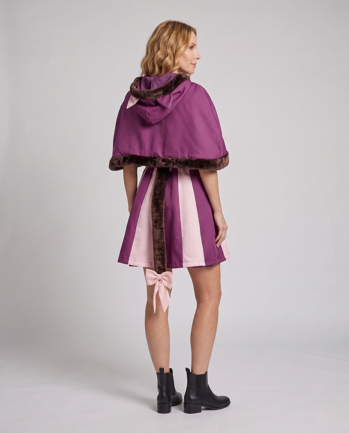Women's hooded cat Halloween costume with pink and purple striped dress, faux fur trimmed capelet and bow tail - view 3