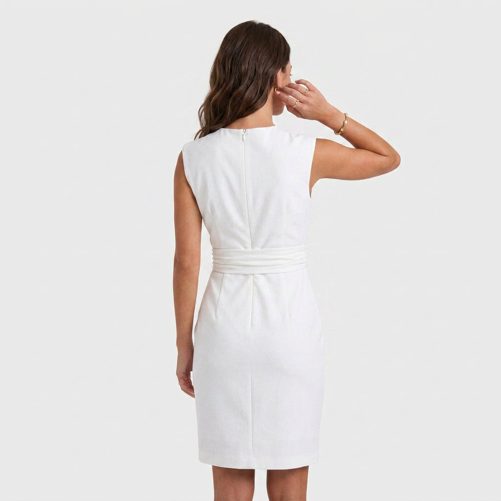 Sleeveless navy blue keyhole cocktail dress with ruched waist and faux wrap skirt - view 6