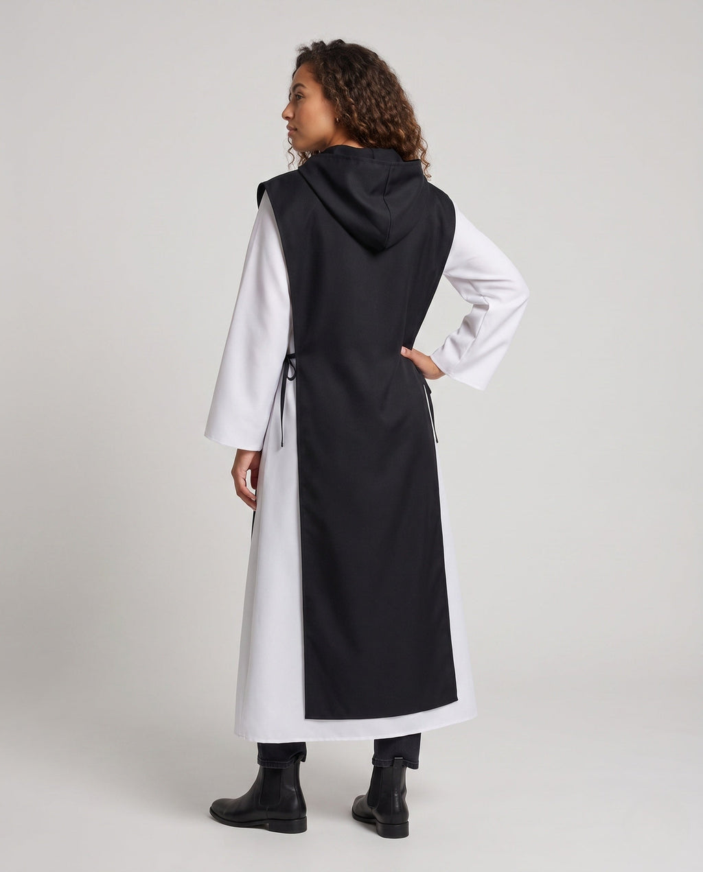 Women's nun Halloween costume with black hooded tabard over white long-sleeve robe - view 3