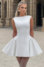 Sleeveless boat neck backless mini dress with fitted bodice and full flared skirt
