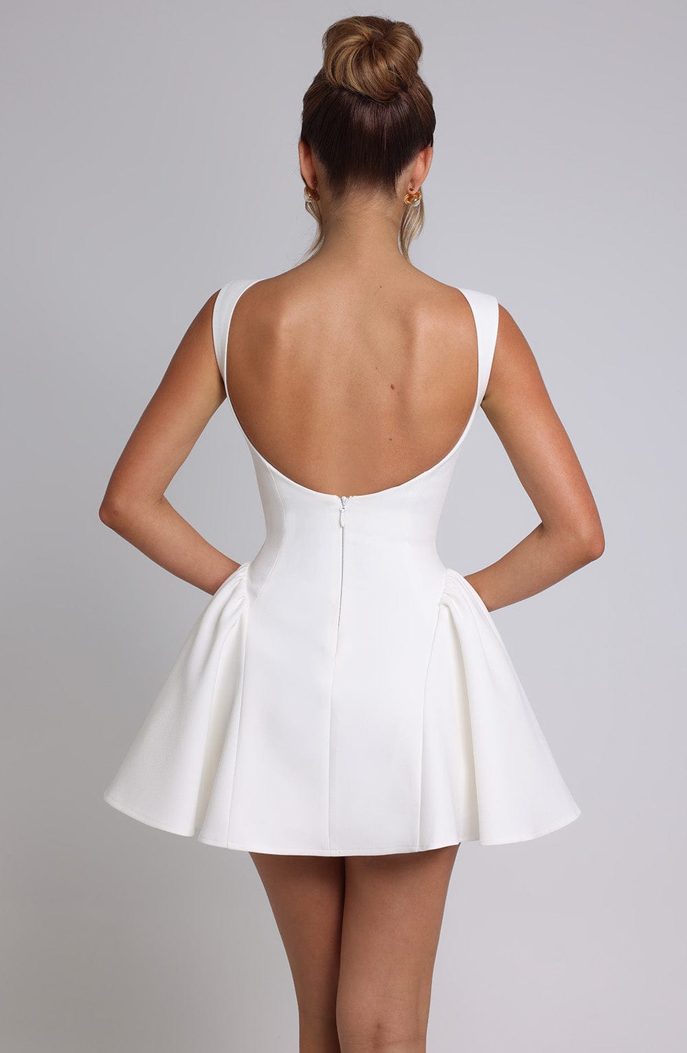 Sleeveless boat neck backless mini dress with fitted bodice and full flared skirt - view 15