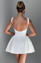 Sleeveless boat neck backless mini dress with fitted bodice and full flared skirt - view 4