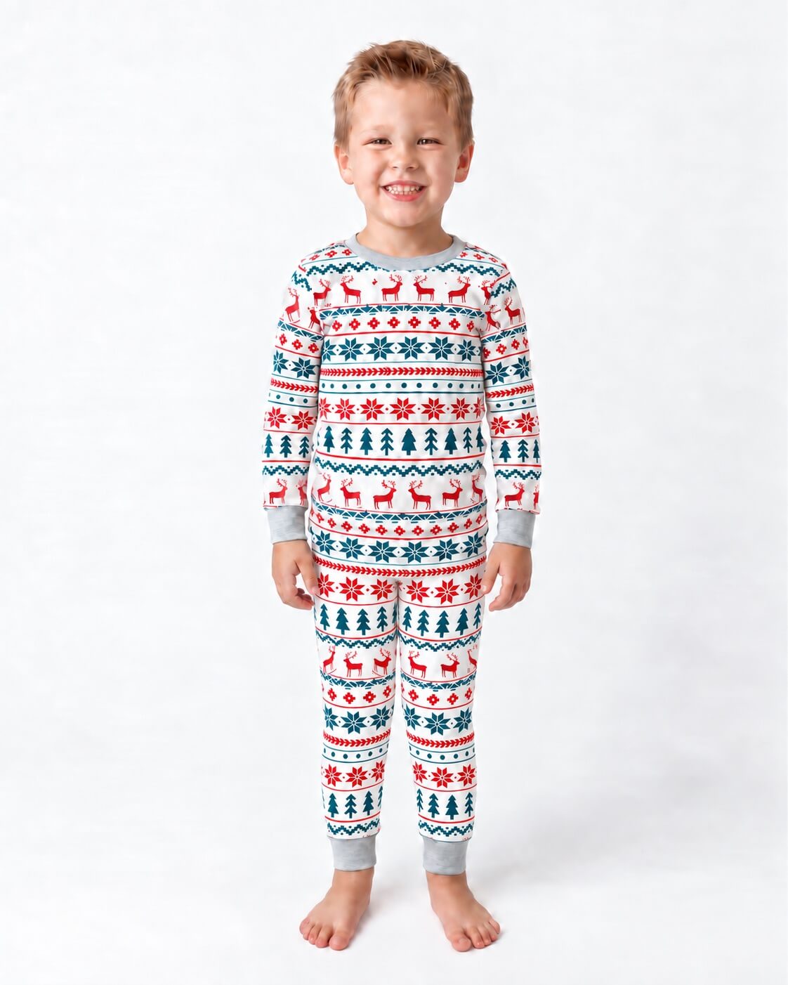 Family wearing matching fair isle Christmas pajamas with reindeer and tree print - view 10
