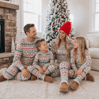 Family wearing matching fair isle Christmas pajamas with reindeer and tree print - view 4