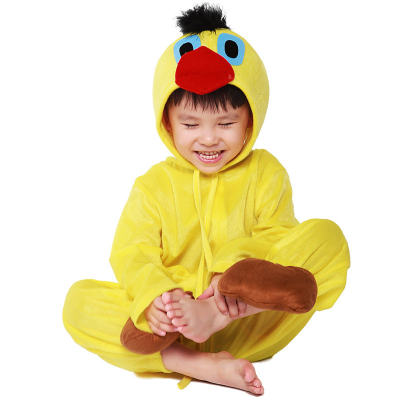 Child wearing a yellow plush duck Halloween costume with beaked hood and brown feet covers - view 3