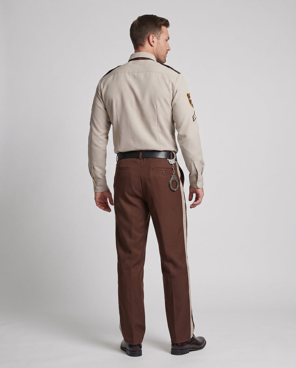 Men's sheriff police costume with tan shirt, brown tie, star badge and striped brown pants - view 3