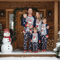 Snowman matching family Christmas pajamas with gray raglan top and navy snowman print pants