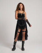 Gothic velvet costume dress with lace-up corset bodice, cross charm and lace-trimmed ruffled high-low skirt