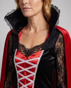 Women's vampire Halloween costume with lace sleeves and red graveyard-print cape - view 2