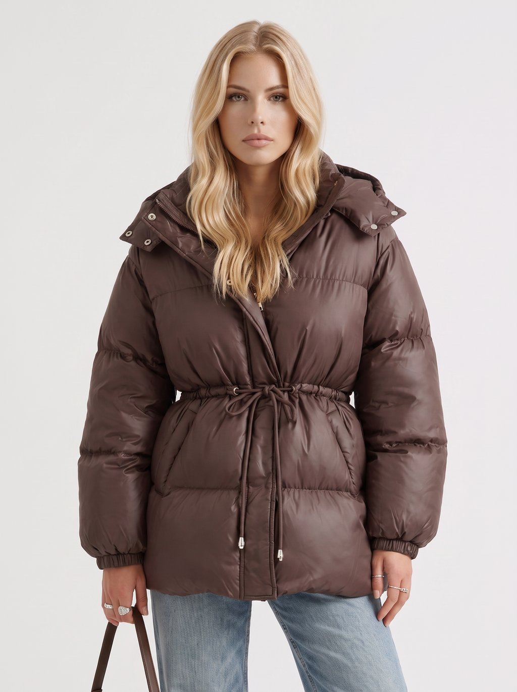 Brown women's puffer jacket with hood and cinched tie waist