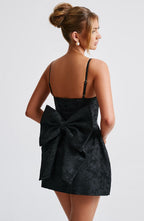 Black floral jacquard homecoming mini dress with plunging V neckline, lace-up back and oversized back bow - view 5