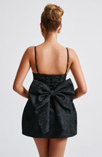 Black floral jacquard homecoming mini dress with plunging V neckline, lace-up back and oversized back bow - view 6