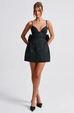 Black floral jacquard homecoming mini dress with plunging V neckline, lace-up back and oversized back bow - view 7