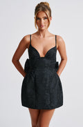 Black floral jacquard homecoming mini dress with plunging V neckline, lace-up back and oversized back bow - view 8