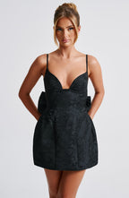 Black floral jacquard homecoming mini dress with plunging V neckline, lace-up back and oversized back bow - view 8
