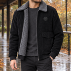 Corduroy zip up jacket with fleece-look collar worn over a crewneck