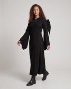 Black hooded Halloween costume dress with bat wings and bell sleeves