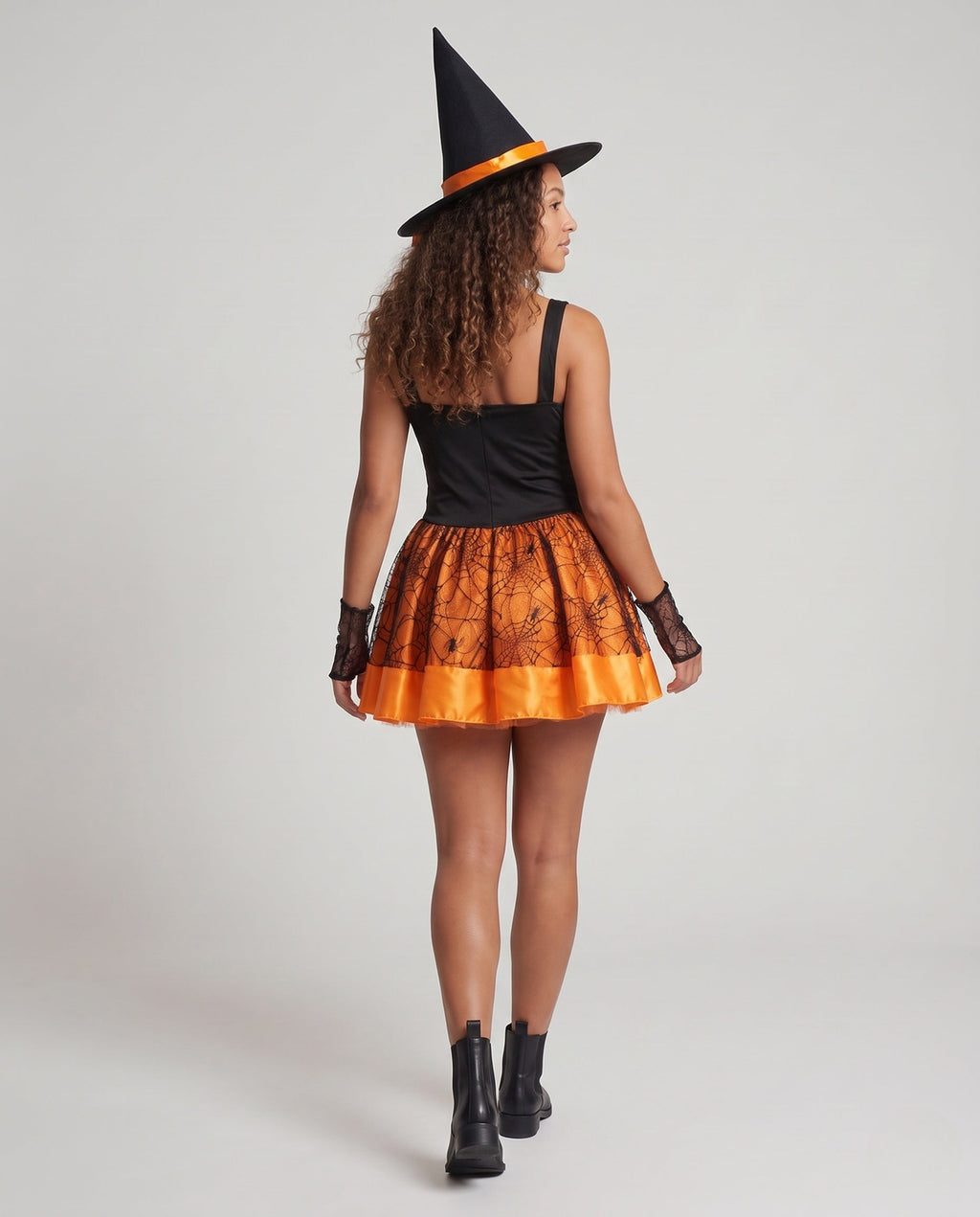 Women's witch Halloween costume with lace-up satin bodice, spiderweb mesh skirt, witch hat and lace arm sleeves - view 3