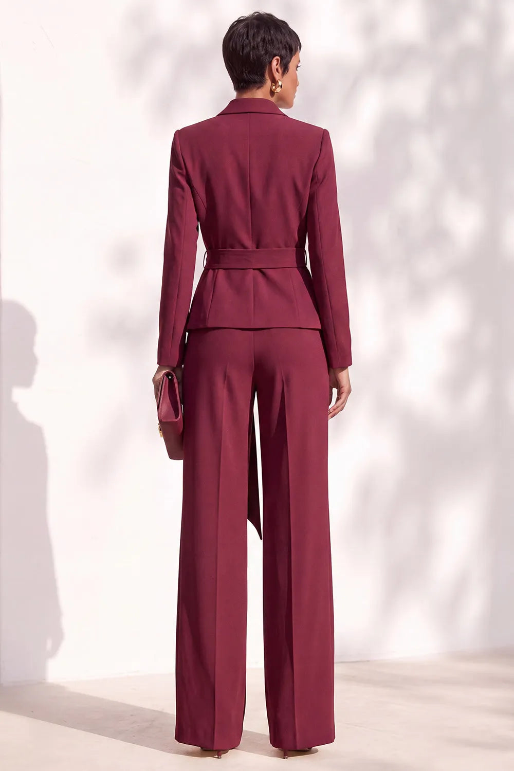 Wrap front blazer with shawl collar and wide leg pants on model - view 2