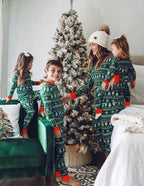 Matching family Christmas pajamas in green tree and snowflake print with red cuffs - view 13
