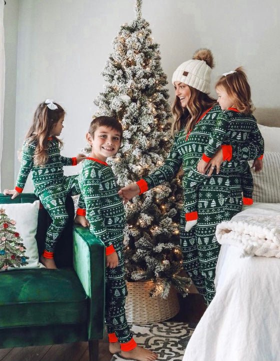 Matching family Christmas pajamas in green tree and snowflake print with red cuffs - view 13