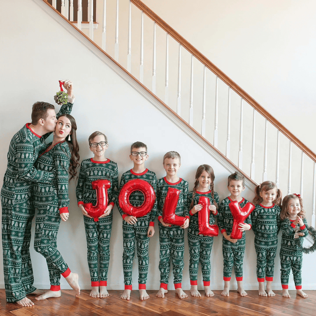 Matching family Christmas pajamas in green tree and snowflake print with red cuffs - view 14